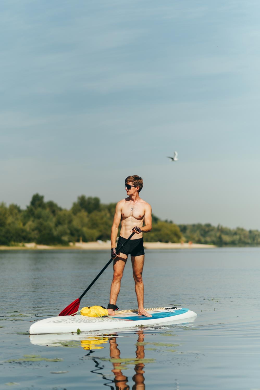 Stand up paddling near Axiom Resort
